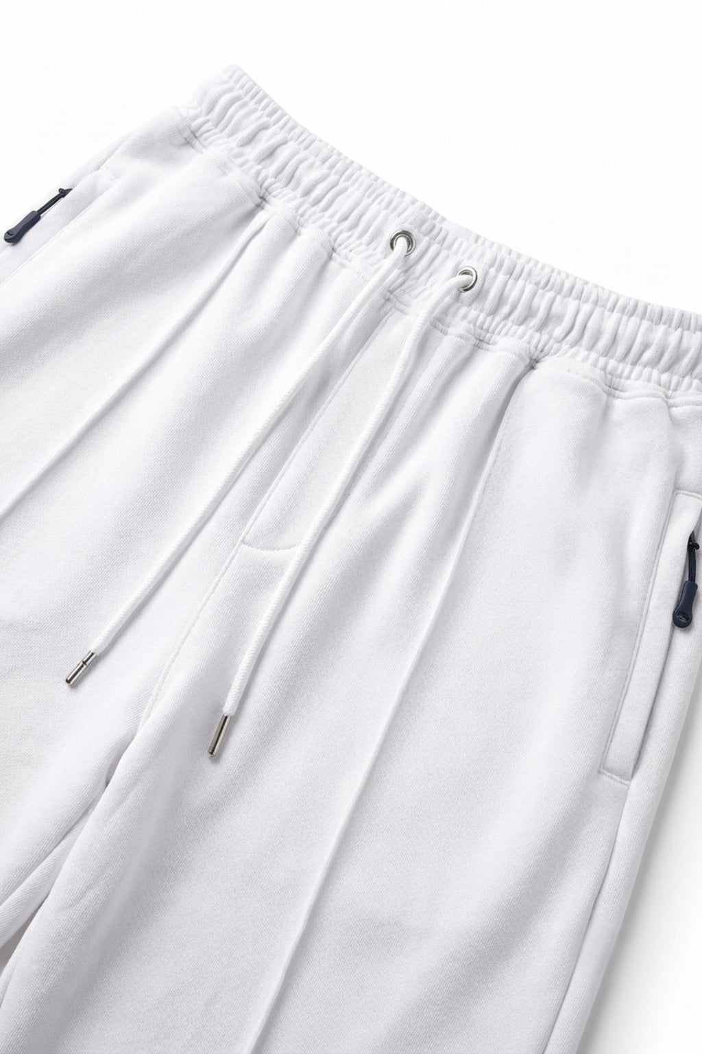 Close-up front view of the Classic Lounge Lightweight Terry Trousers in Optic White, highlighting the soft loopback terry texture, waistband, and drawstrings.