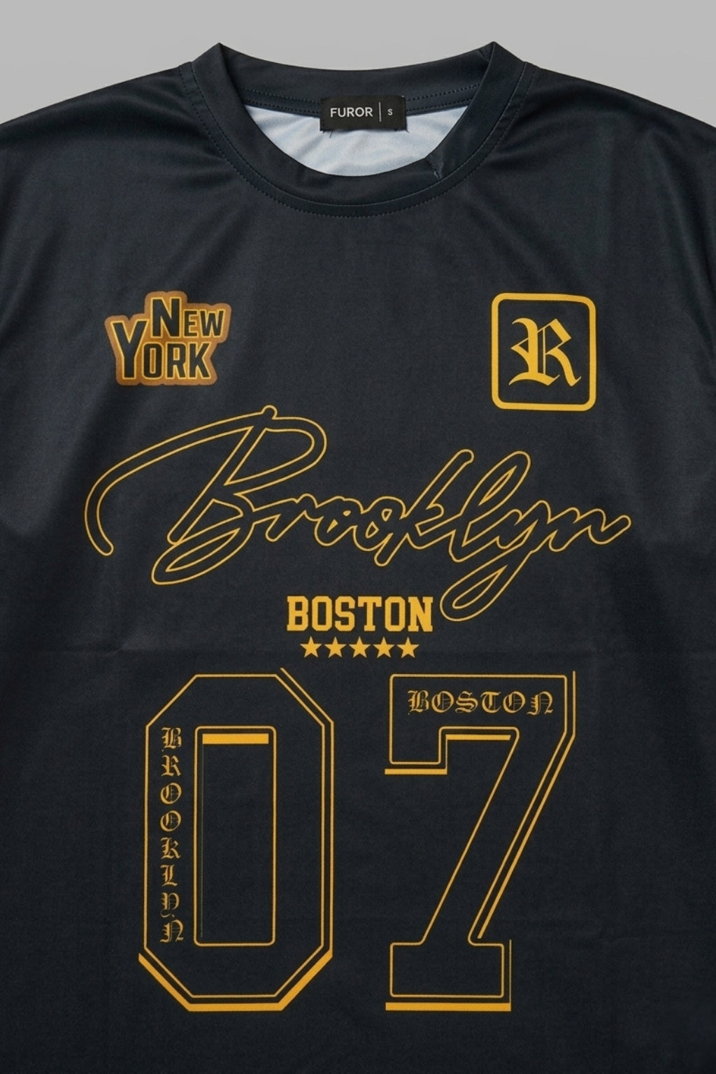 Close-up of Athletic Interlock fabric and high-definition Brooklyn Boston print on Black jersey.
