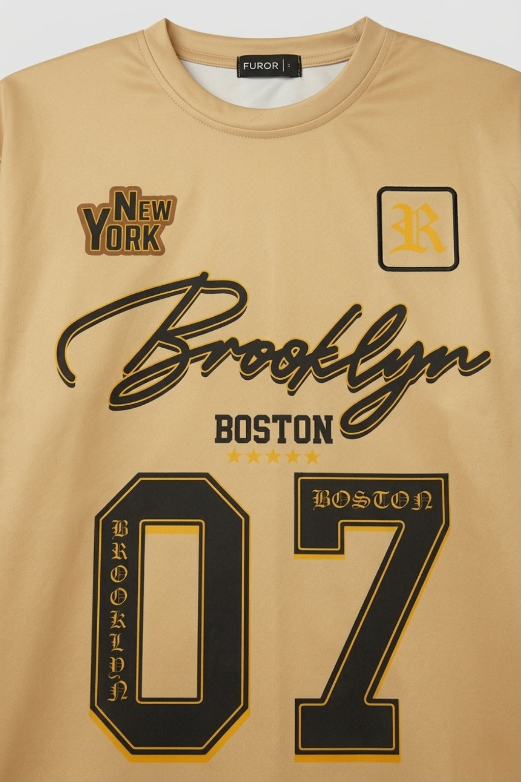 Close-up of Athletic Interlock fabric and high-definition Brooklyn Boston print on Sahara jersey.