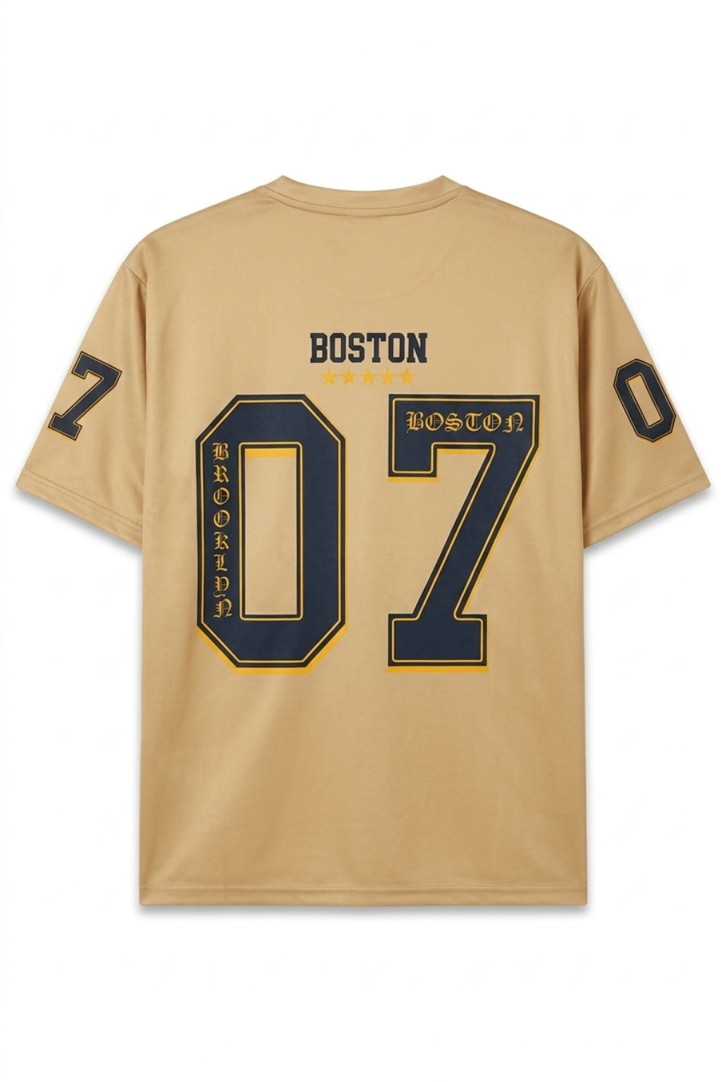 Full back flat lay of The Coastal Hybrid Jersey in Sahara showing boxy silhouette and athletic graphics.