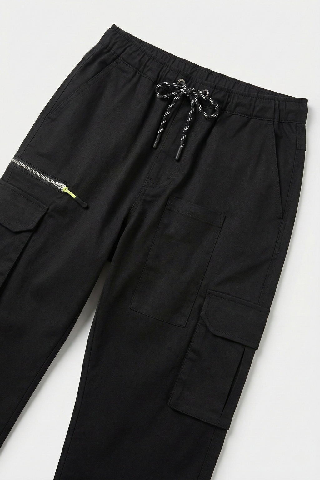 Detailed view of the functional utility pockets on Eliteez Black cargos.