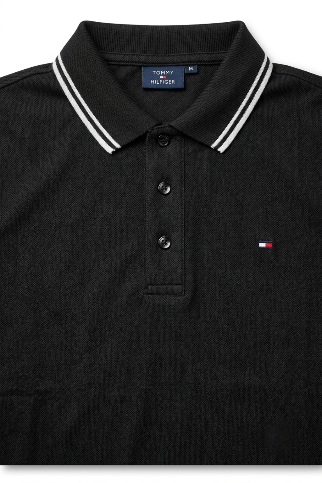 Close-up detail of Eliteez Classic Piqué Polo Black premium pique and embroidered logo