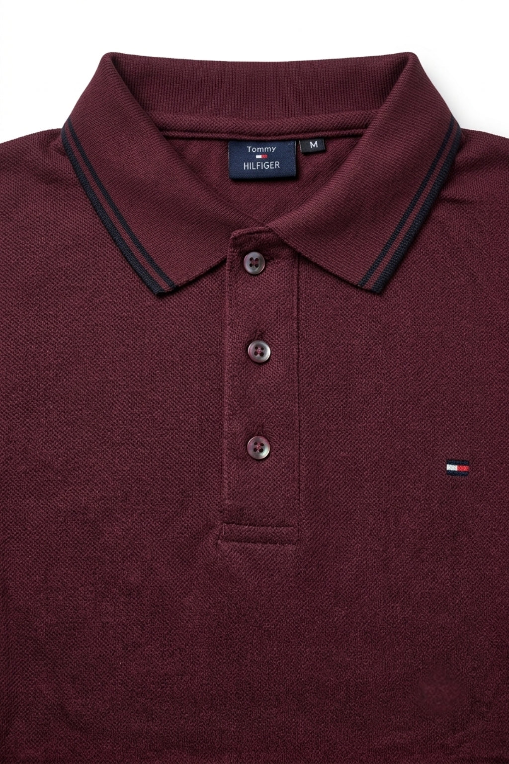 Close-up detail of Eliteez Classic Piqué Polo Burgundy premium pique and embroidered logo