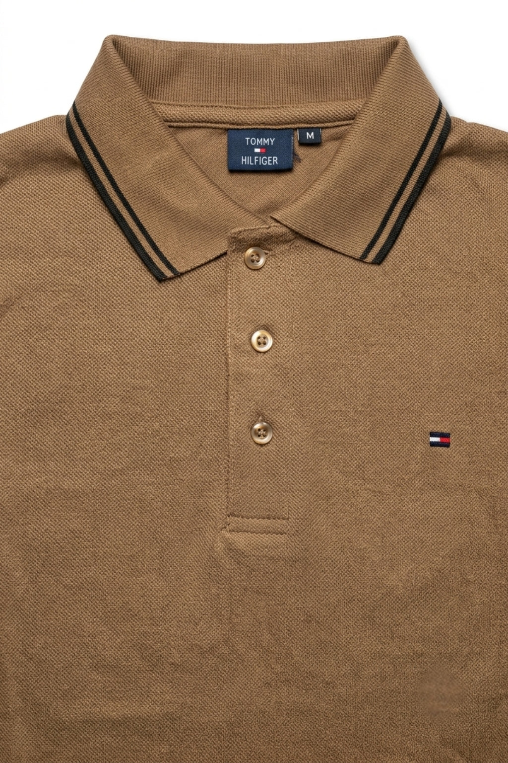 Close-up detail of Eliteez Classic Piqué Polo – Mocha premium pique and embroidered logo.