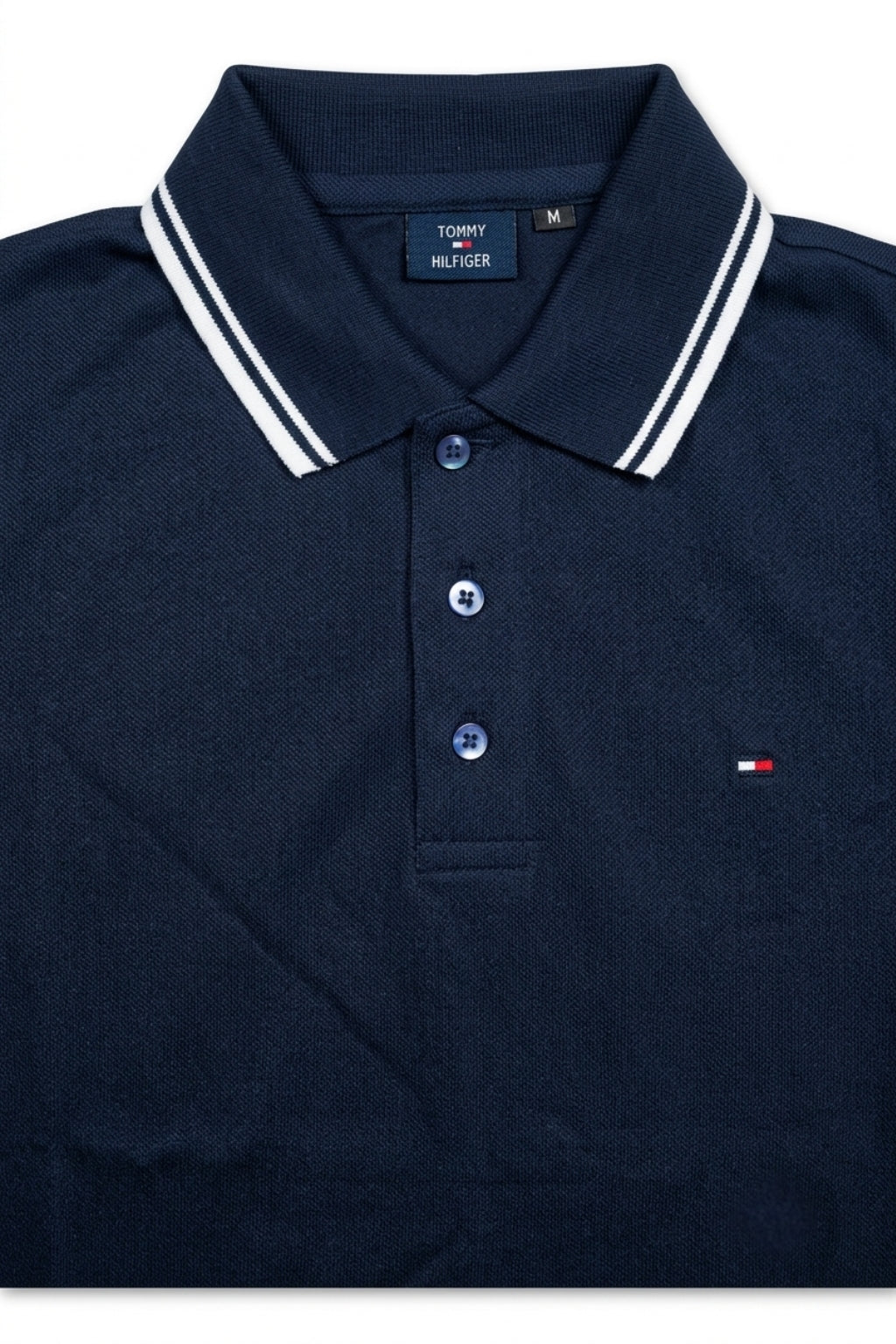 Close-up detail of Eliteez Classic Piqué Polo Navy Blue premium pique and embroidered logo