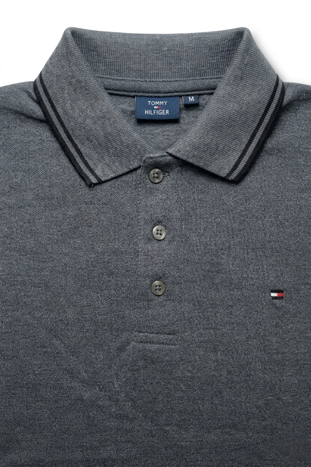 Close-up detail of Eliteez Classic Piqué Polo – Steel Grey premium pique and embroidered logo.