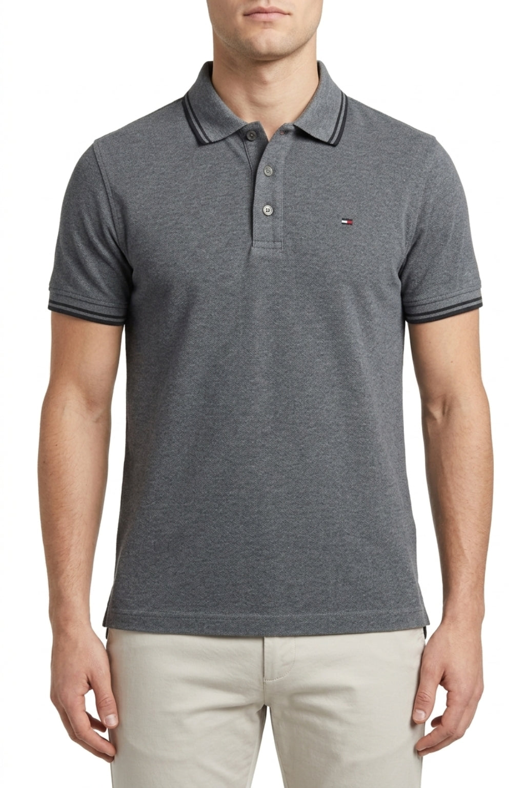 Male model wearing the Eliteez Classic Piqué Polo – Steel Grey for a smart-casual look.