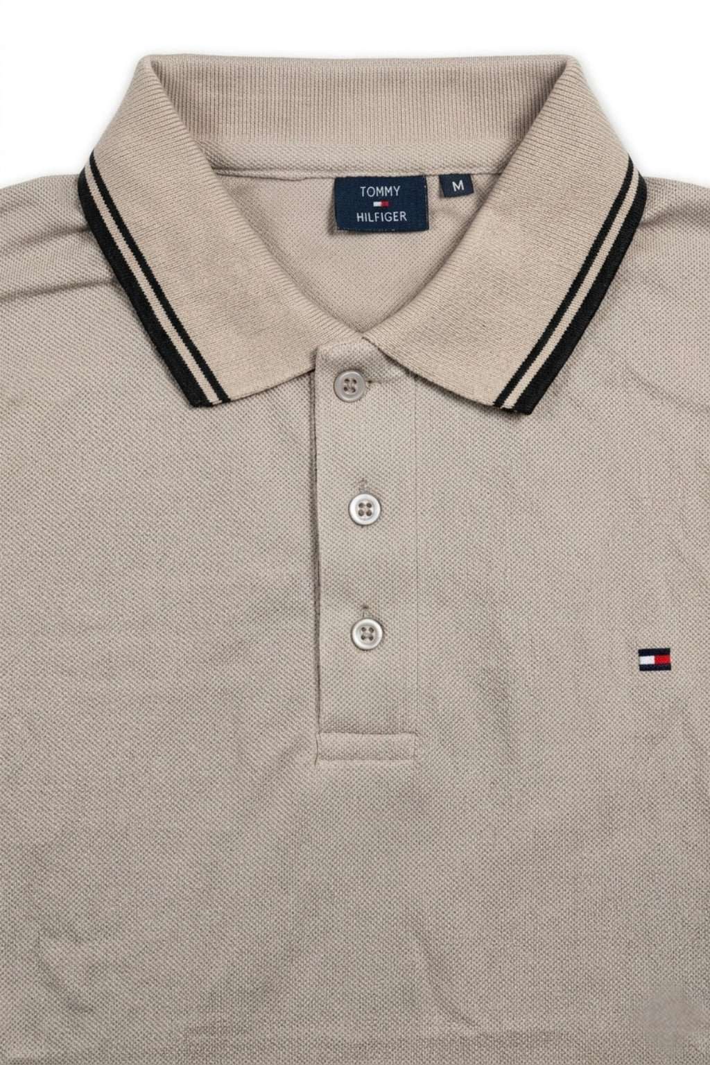 Close-up detail of Eliteez Classic Piqué Polo Taupe premium pique and embroidered logo