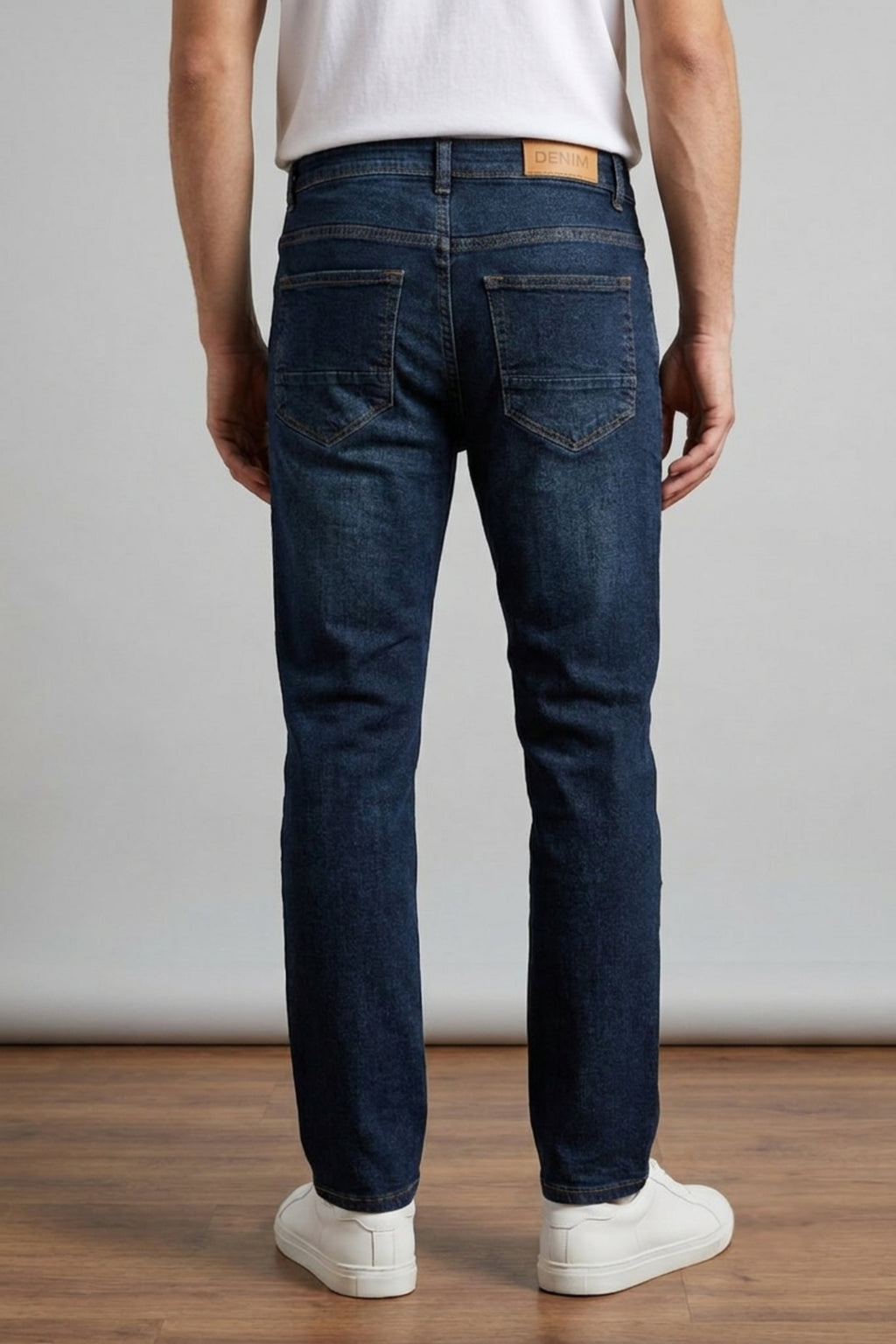 Model wearing Eliteez Classic Prime Dark Indigo Denim Jeans, back view