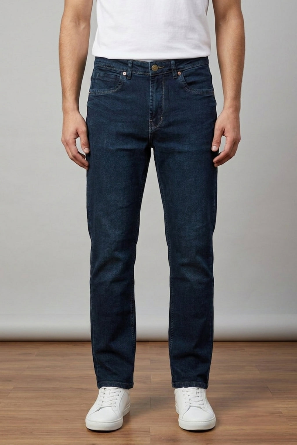 Model wearing Eliteez Classic Prime Dark Indigo Denim Jeans, straight fit front view