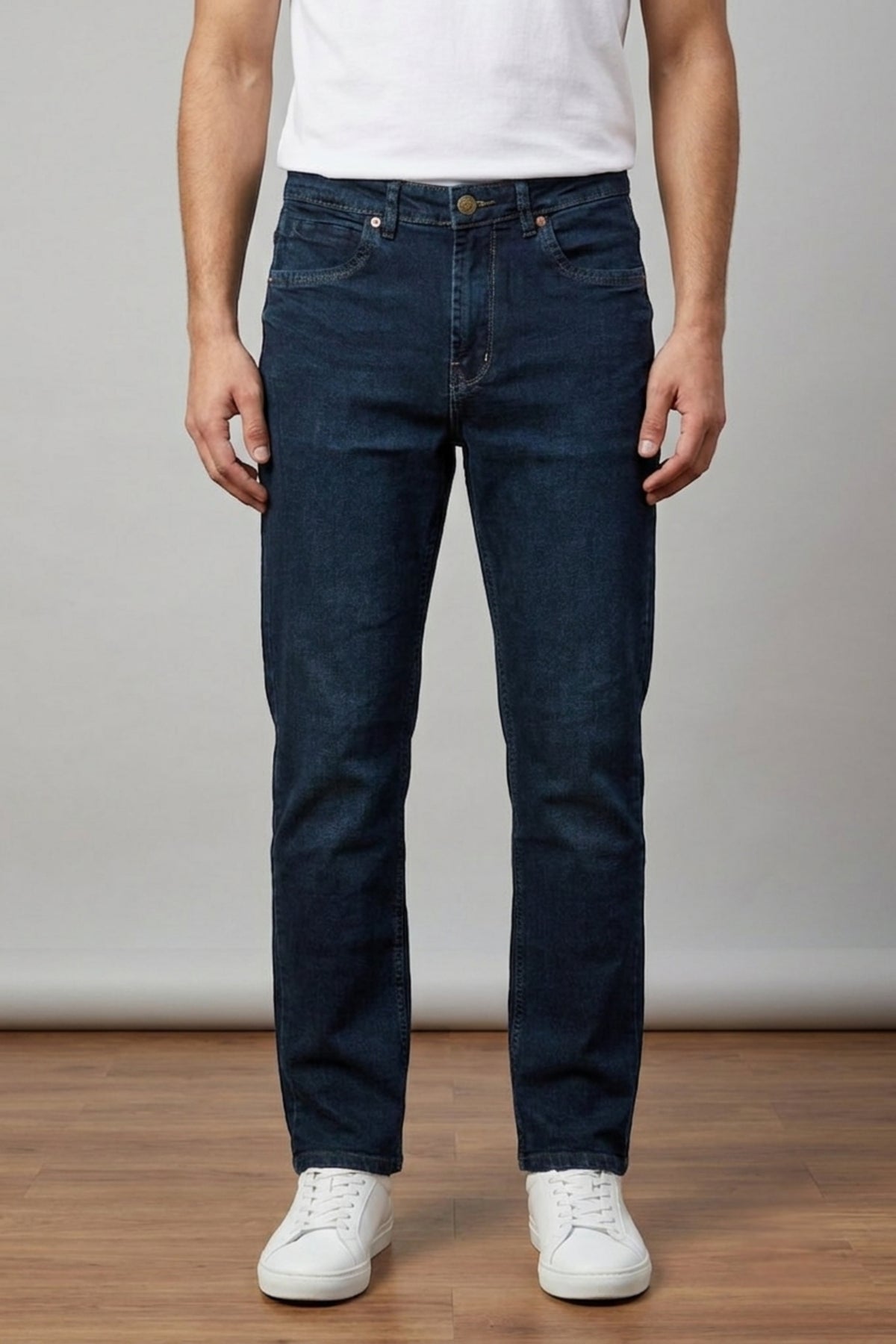 Model wearing Eliteez Classic Prime Dark Indigo Denim Jeans, straight fit front view