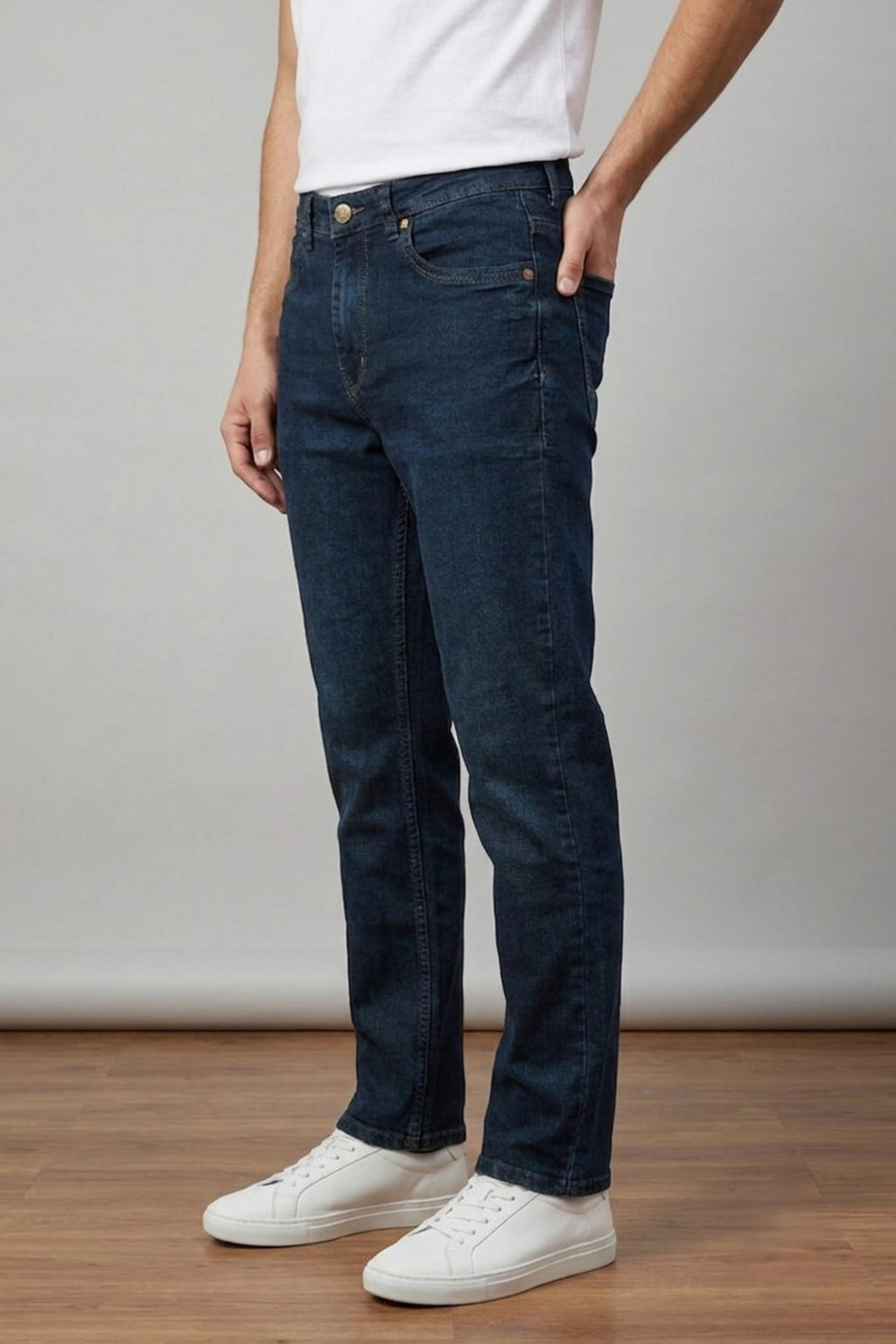 Side view of model wearing Eliteez Classic Prime Dark Indigo Denim Jeans