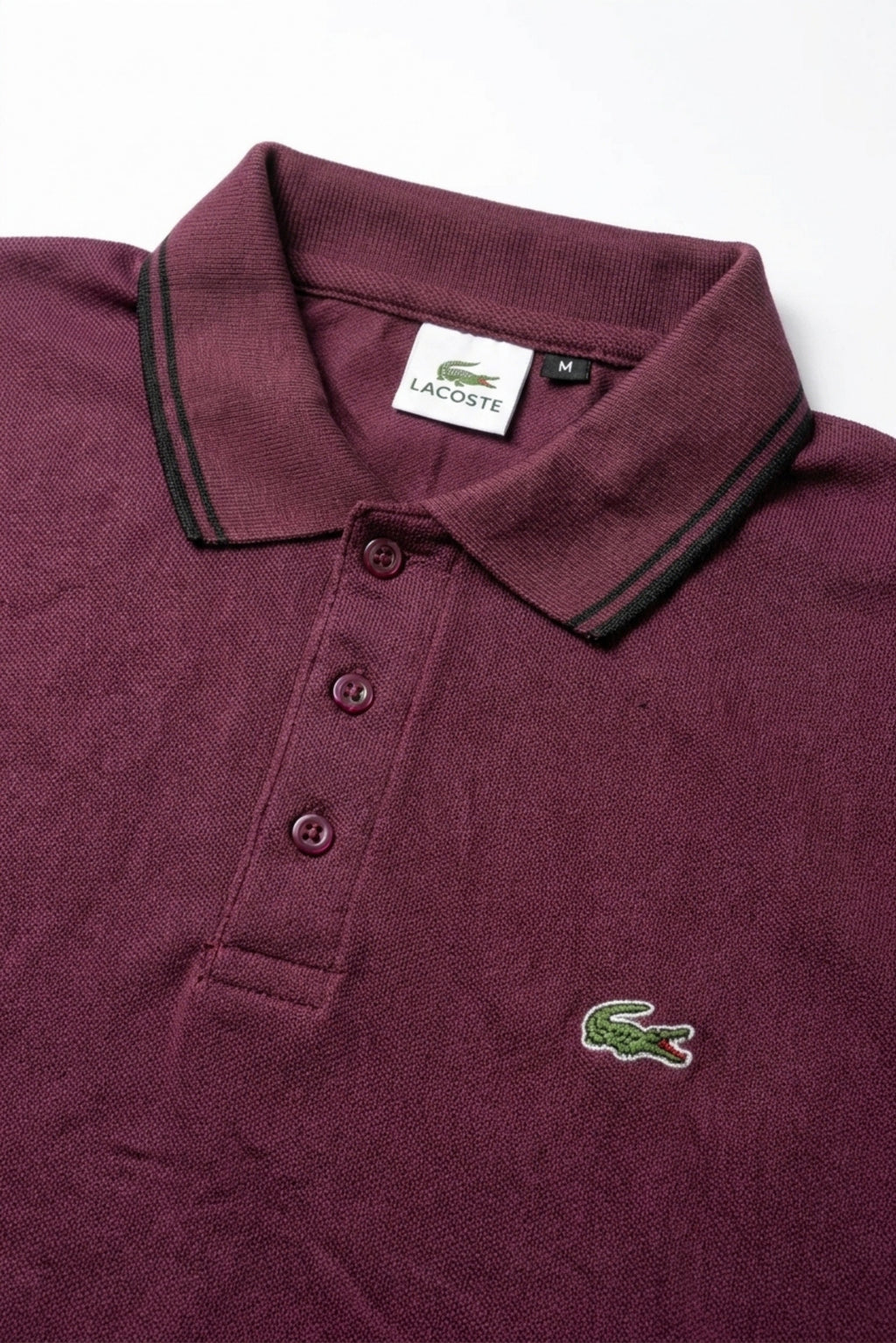 Close-up detail of Eliteez Classic Stripe Collar Polo Burgundy premium pique and embroidered logo