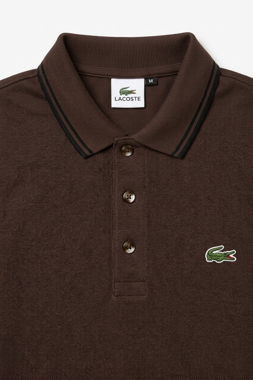 Close-up detail of Eliteez Classic Stripe Collar Polo - Coffee premium pique and embroidered logo.