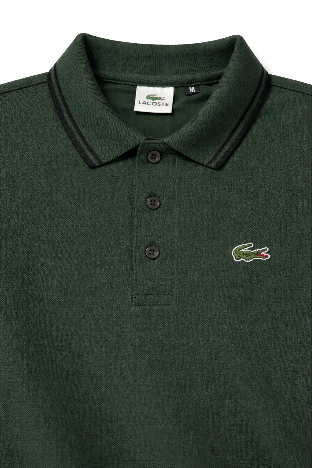 Close-up detail of Eliteez Classic Stripe Collar Polo - Forest Green premium pique and embroidered logo.