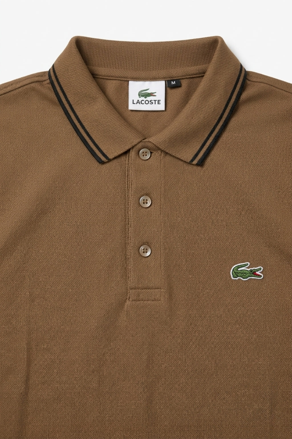 Close-up detail of Eliteez Classic Stripe Collar Polo - Mocha premium pique and embroidered logo.