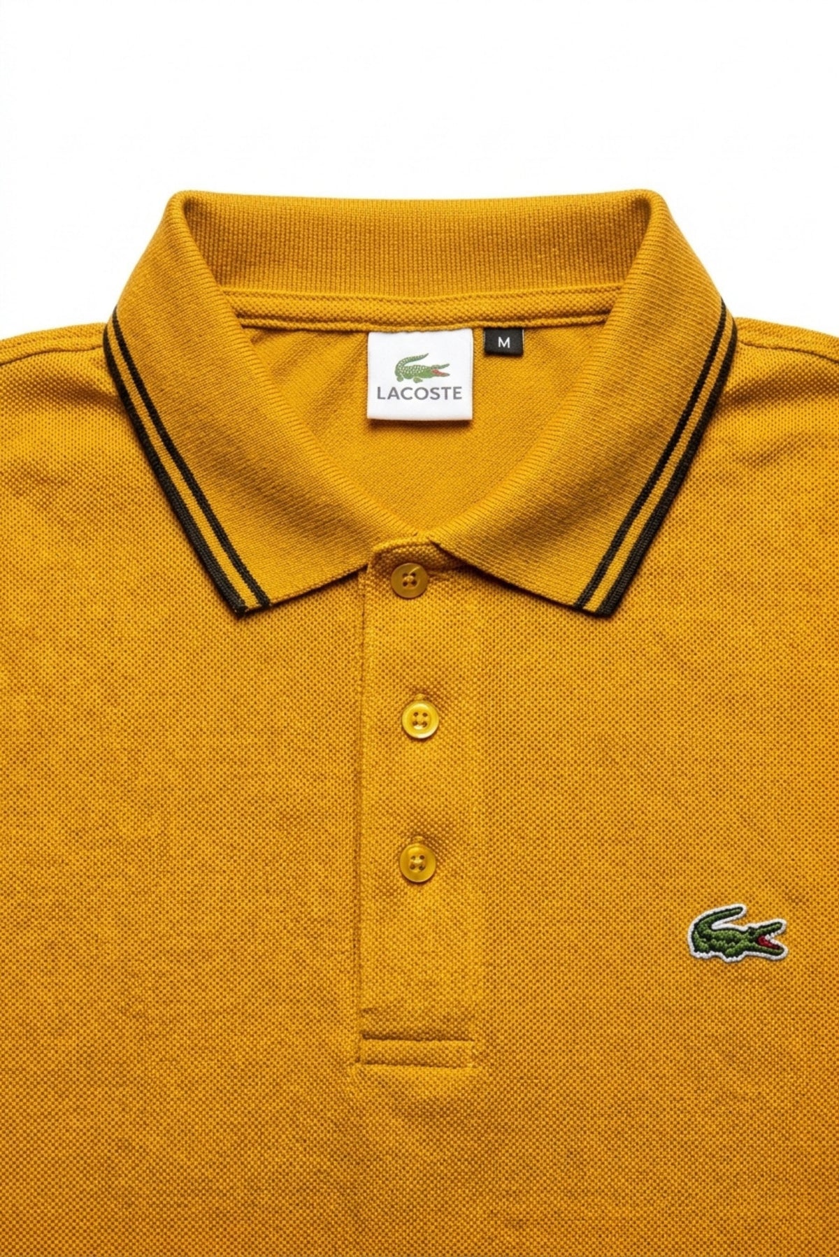 Close-up detail of Eliteez Classic Stripe Collar Polo Mustard premium pique and embroidered logo