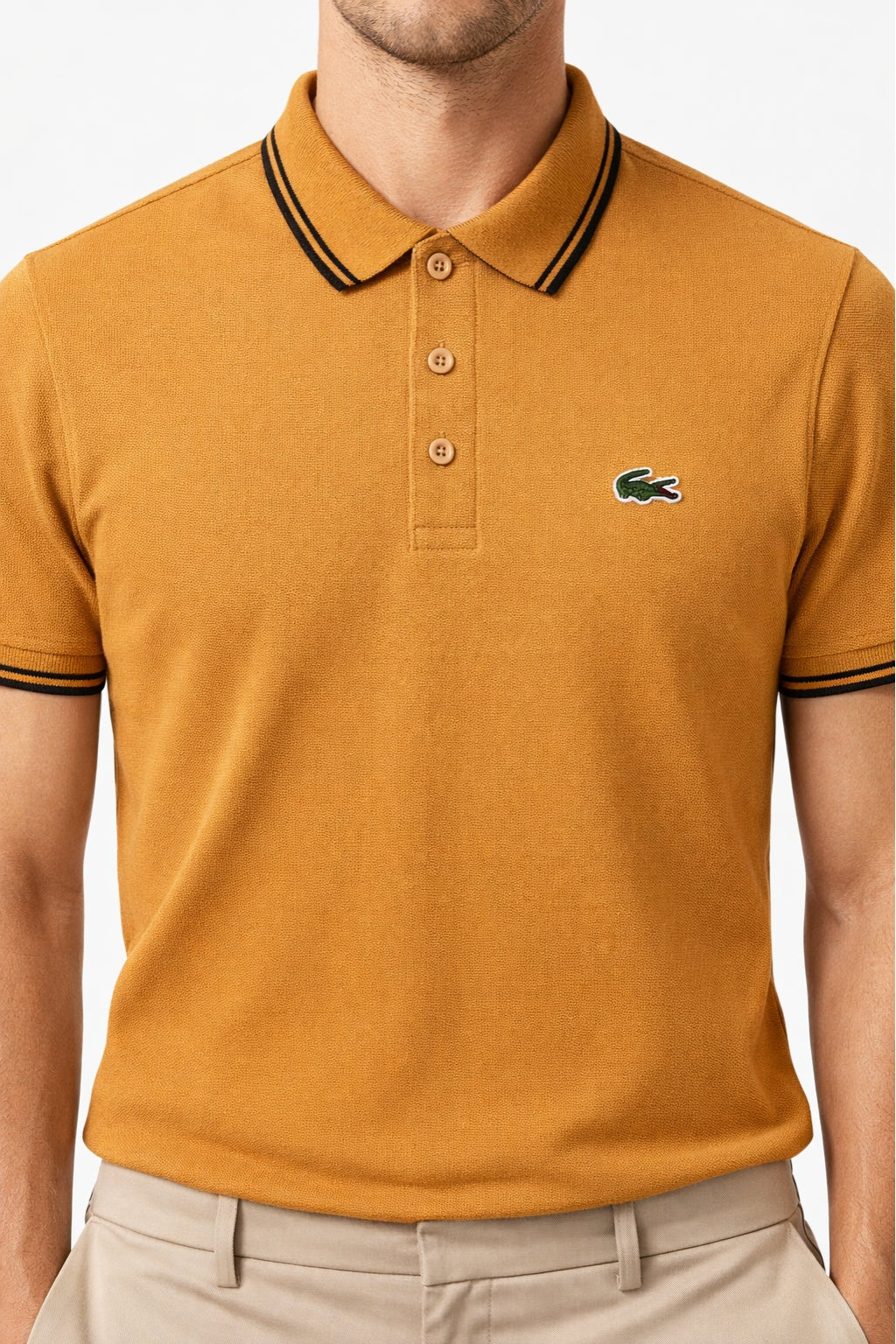Male model wearing the Eliteez Classic Stripe Collar Polo - Mustard Gold for a smart-casual look.