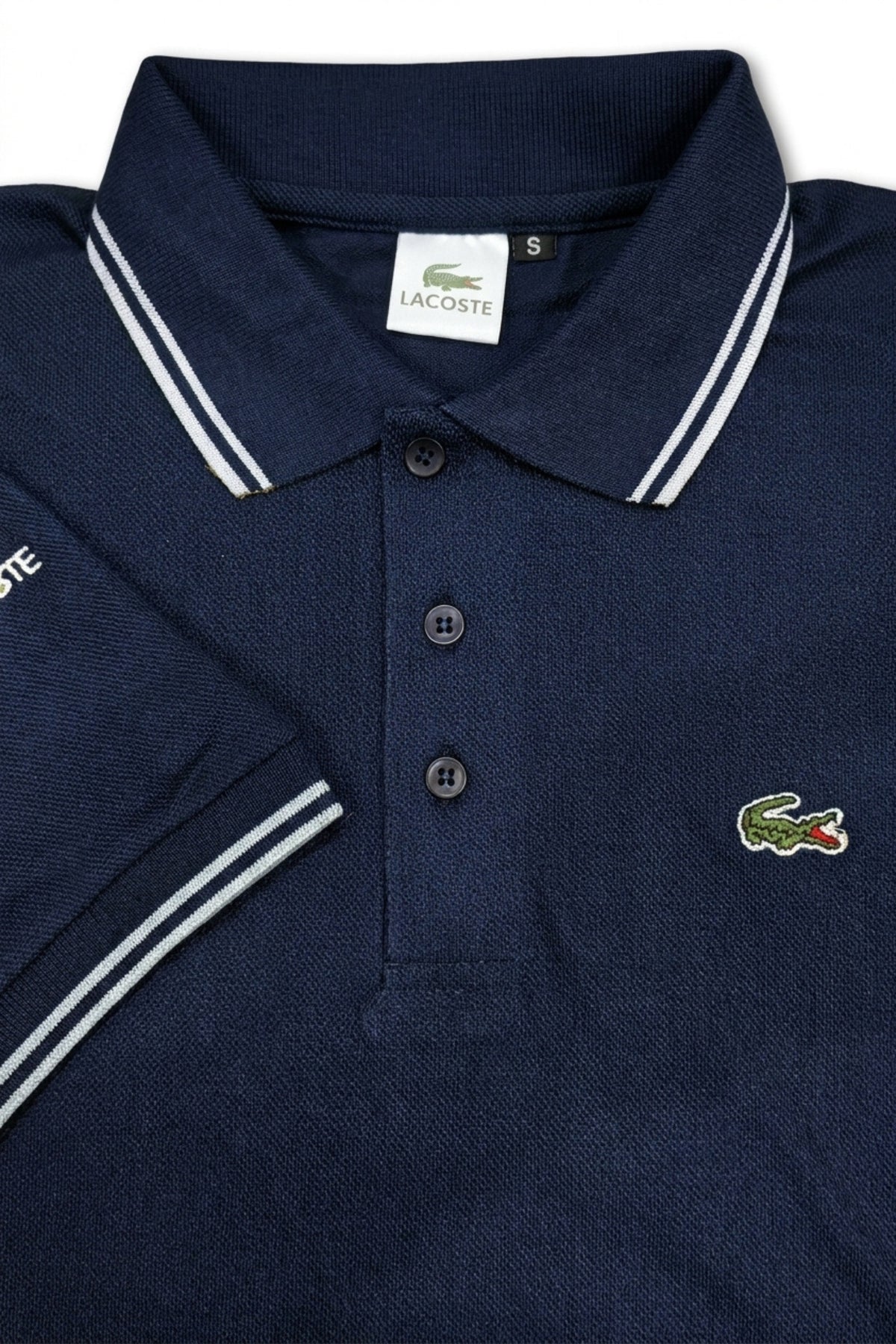 Close-up detail of Eliteez Classic Stripe Collar Polo Navy Blue premium pique and embroidered logo