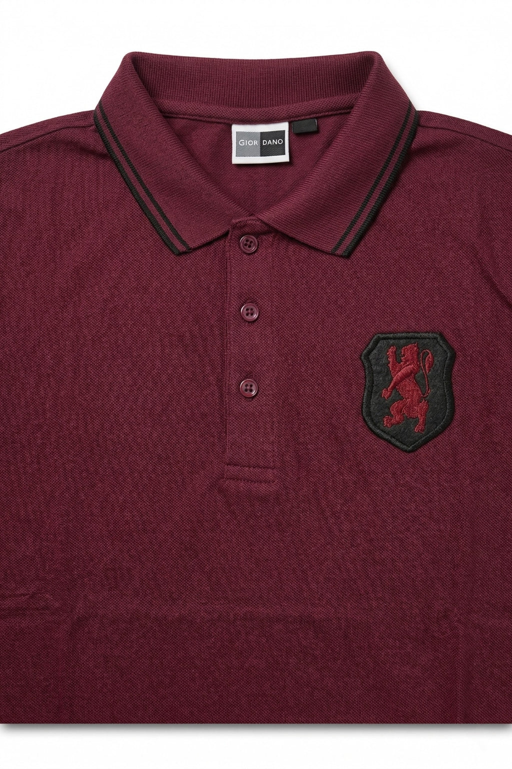 Close-up detail of Eliteez embroidered Lion Pique Polo – Burgundy premium pique and embroidered logo.