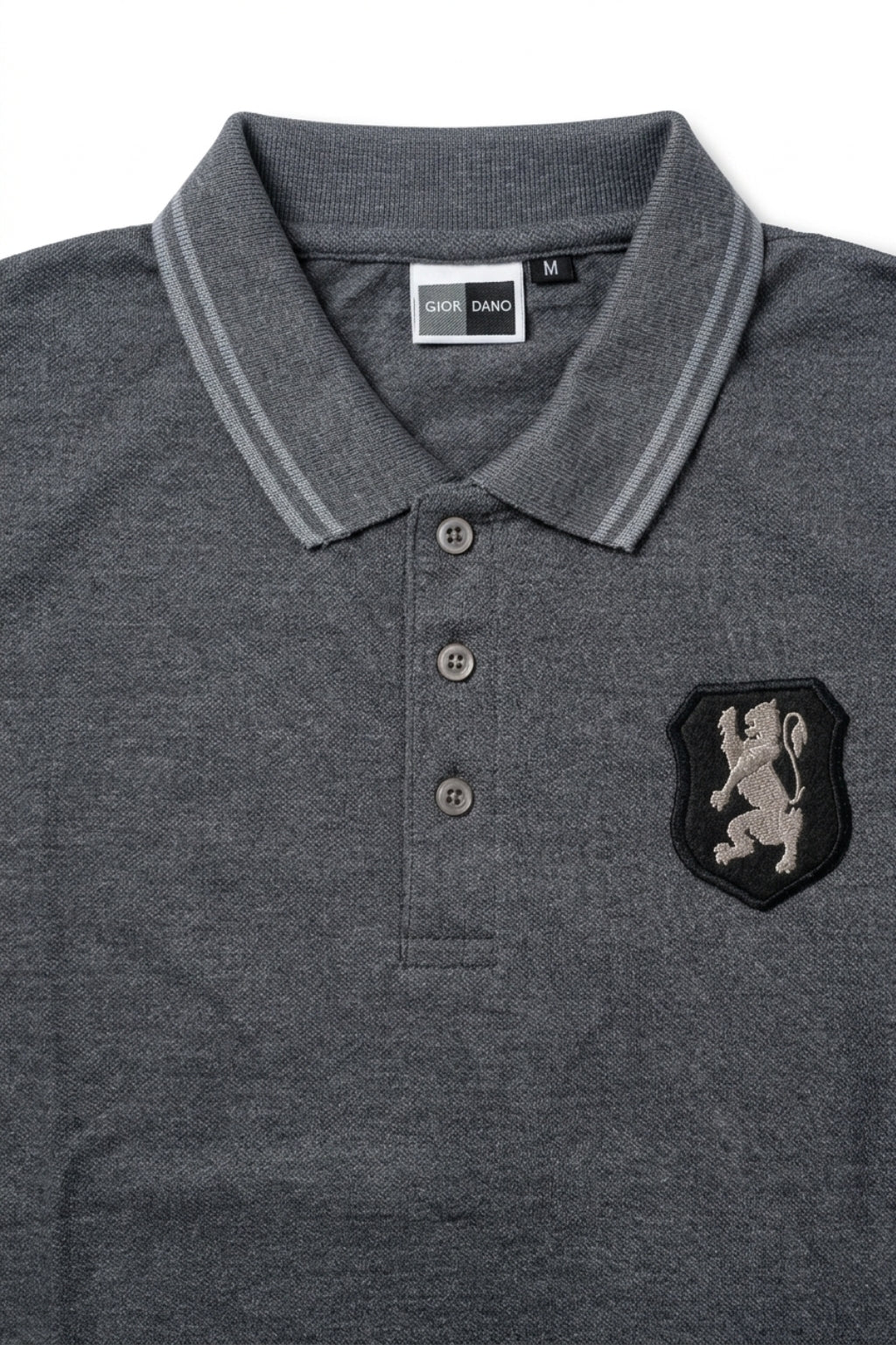 Close-up detail of Eliteez embroidered Lion Pique Polo – Steel Grey premium pique and embroidered logo.