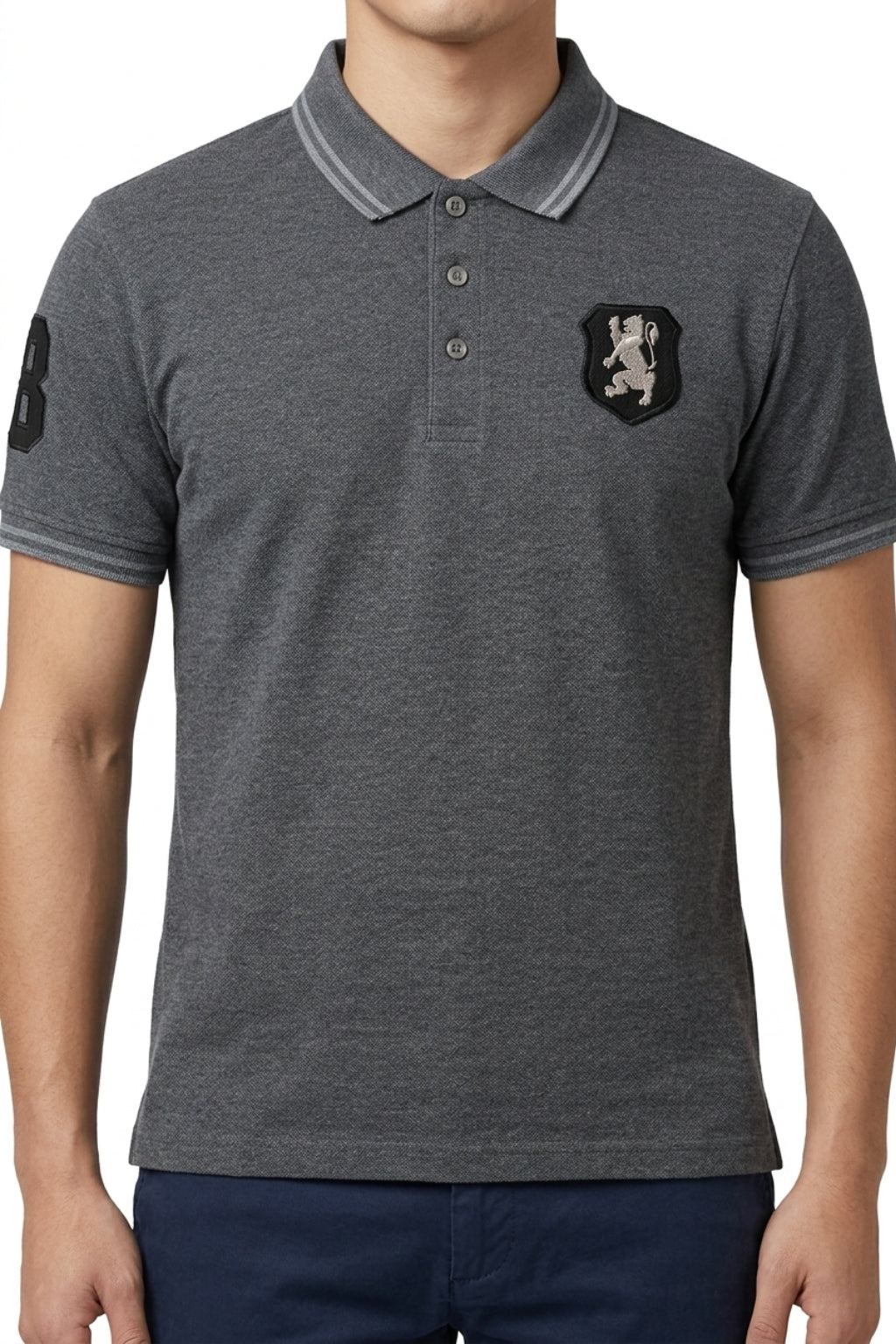 Male model wearing the Eliteez embroidered Lion Pique Polo – Steel Grey for a smart-casual look.