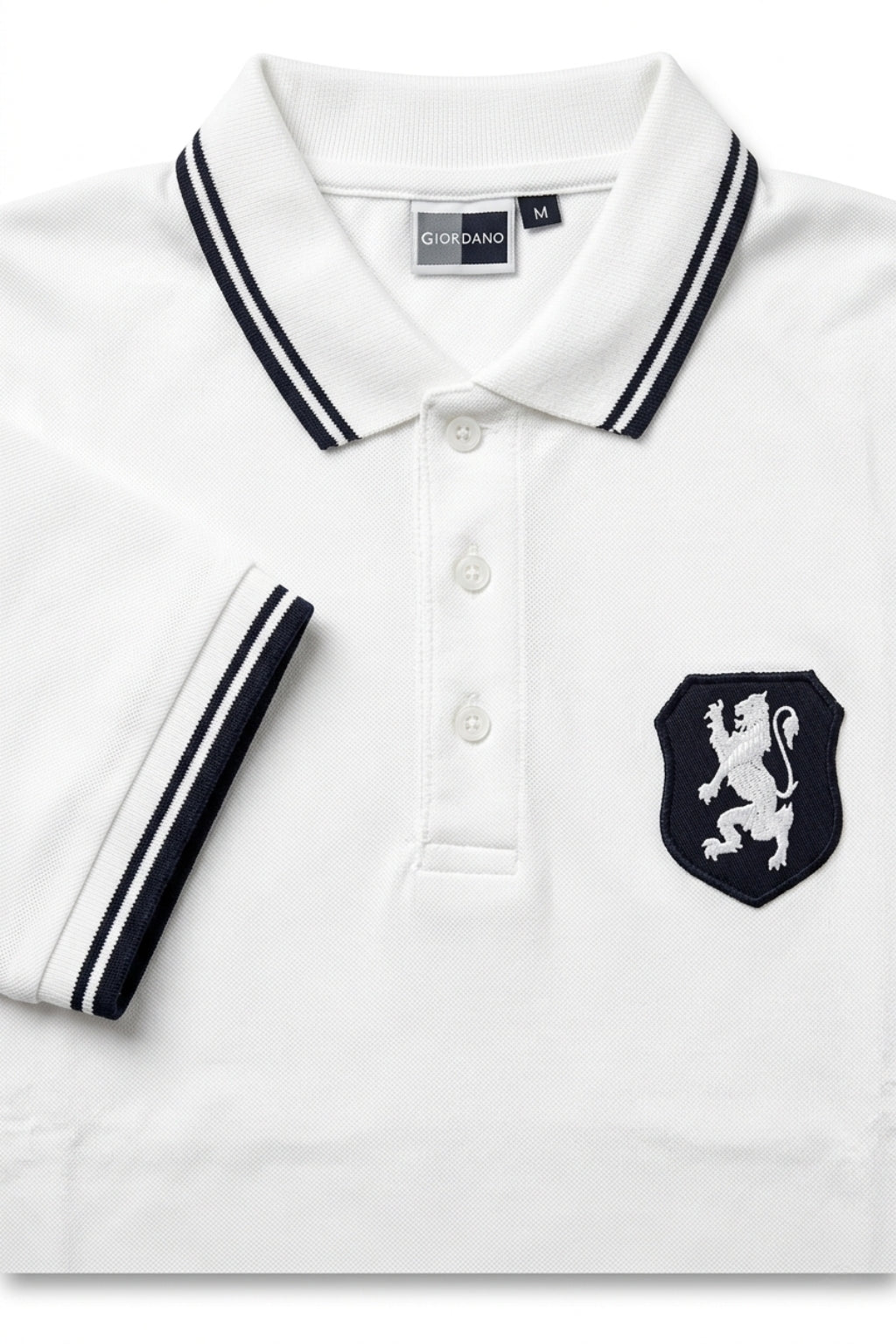 Close-up detail of Eliteez embroidered Lion Pique Polo – White premium pique and embroidered logo.