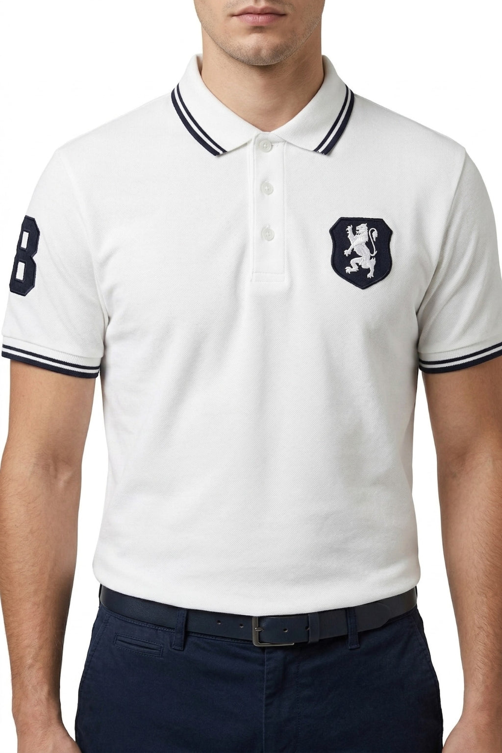 Male model wearing the Eliteez embroidered Lion Pique Polo – White for a smart-casual look.