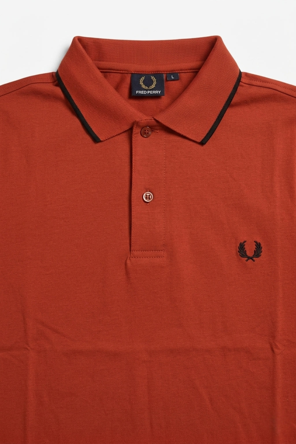 Eliteez Heritage Laurel Polo Shirt in Rust Orange, back view on model