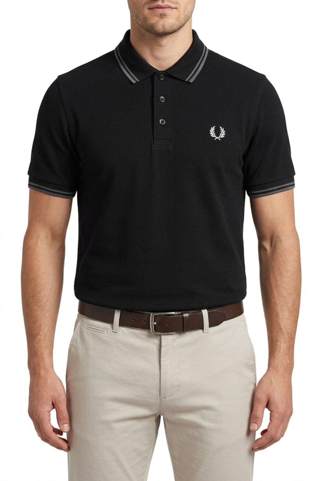 Male model wearing the Eliteez Heritage Twin-Tip Polo - Black for a smart-casual look.
