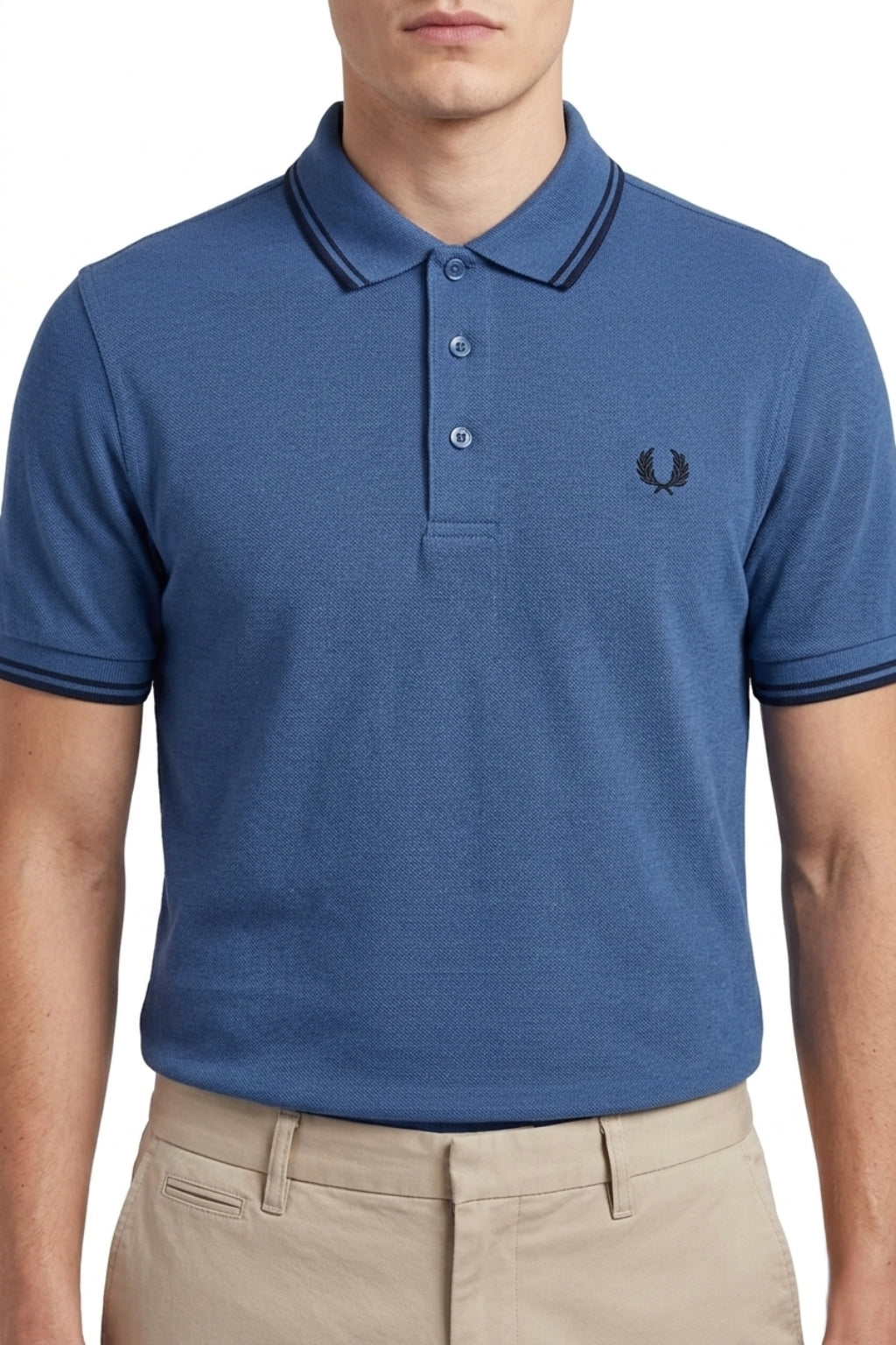 Male model wearing the Eliteez Heritage Twin-Tip Polo - Blue for a smart-casual look.