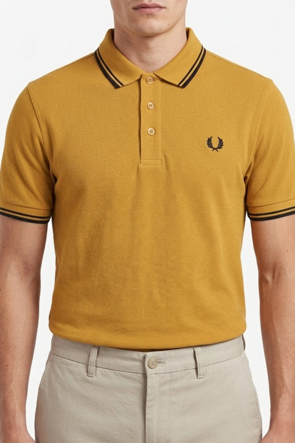 Male model wearing the Eliteez Heritage Twin-Tip Polo - Mustard for a smart-casual look.