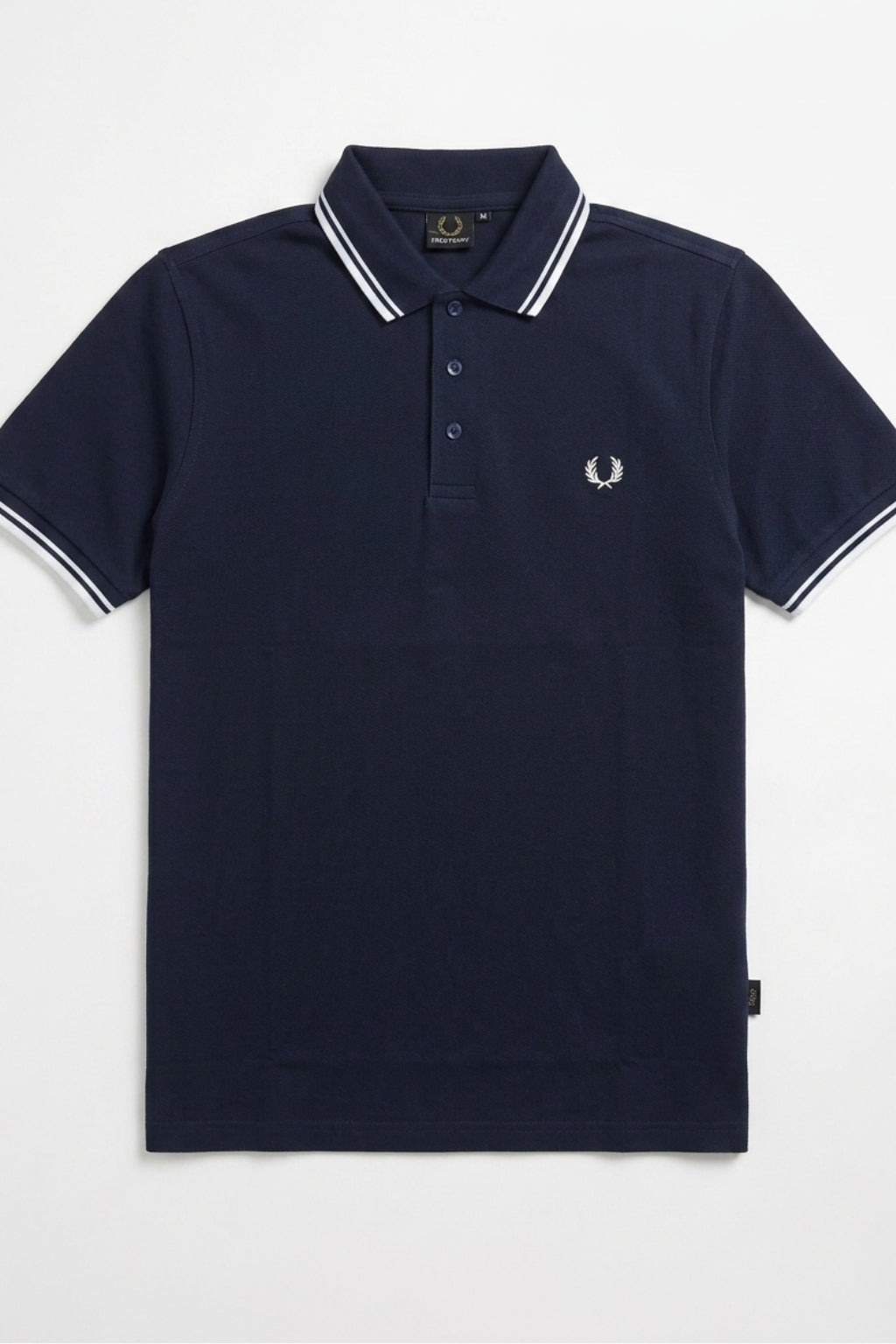 Front view of the Eliteez Heritage Twin-Tip Polo - Navy Blue featuring a classic collar.