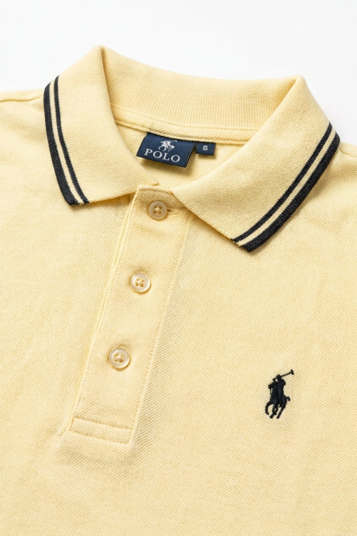 Front view of Eliteez Piqué Polo Rider in Pale Lemon featuring contrast tipping