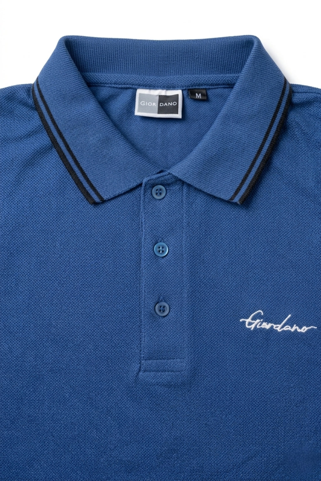 Close-up detail of Eliteez Signature Twin-Tip Polo - Blue premium pique and embroidered logo.
