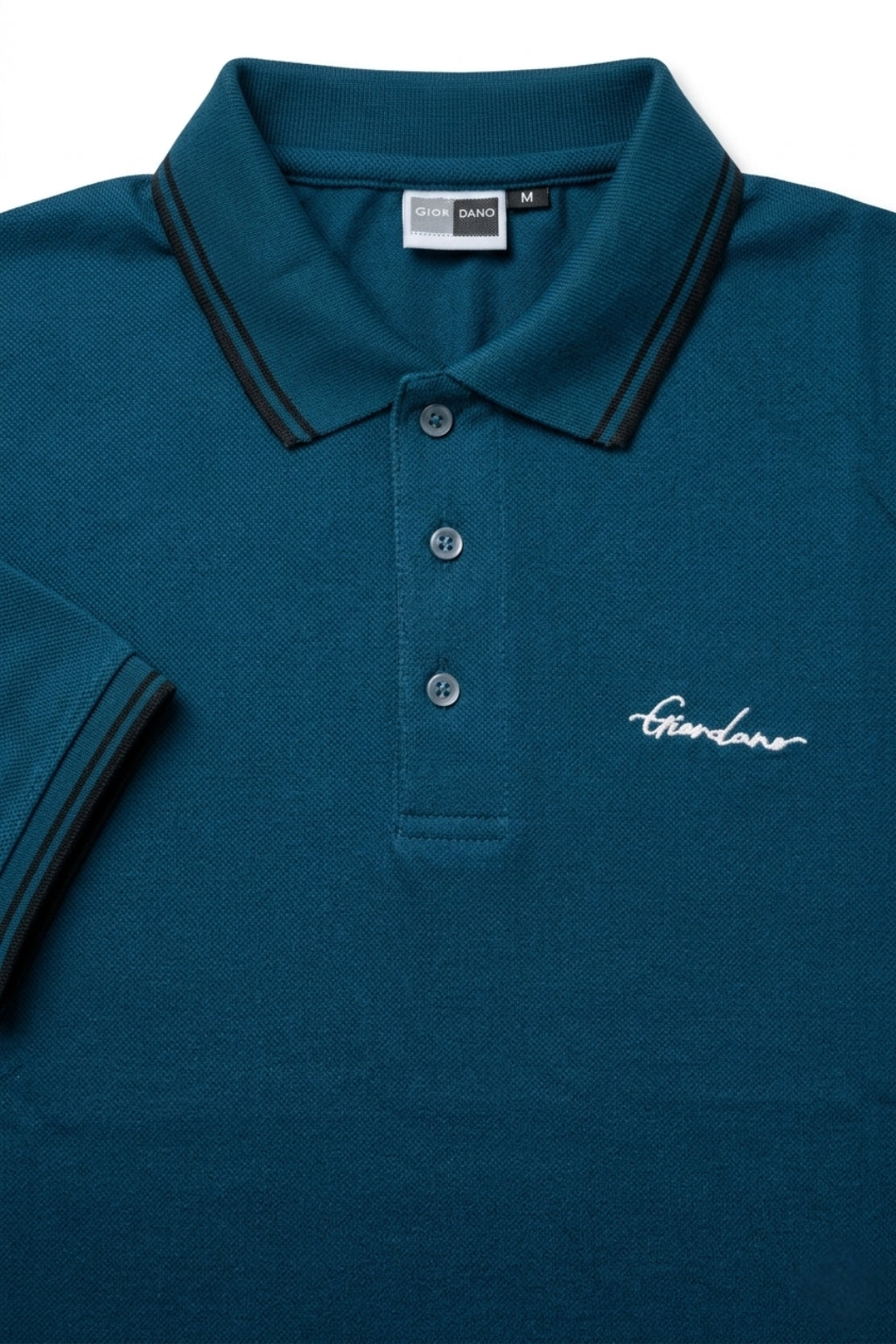 Close-up detail of Eliteez Signature Twin-Tip Polo - Dark Teal premium pique and embroidered logo.