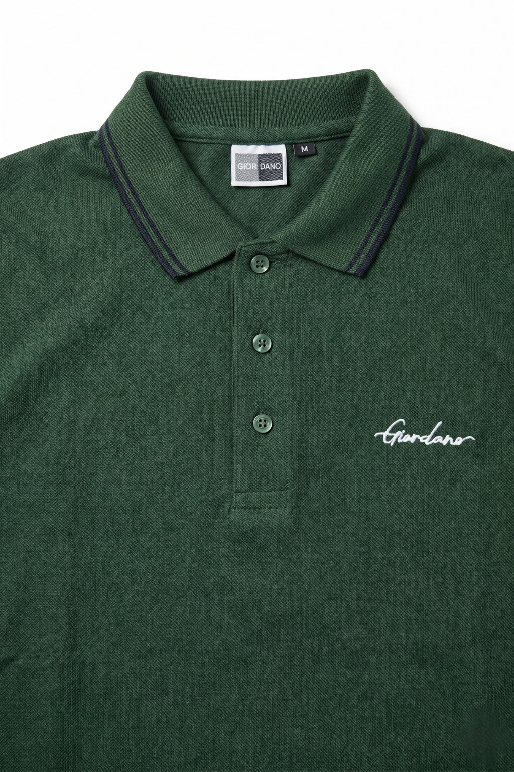 Close-up detail of Eliteez Signature Twin-Tip Polo - Forest Green premium pique and embroidered logo.