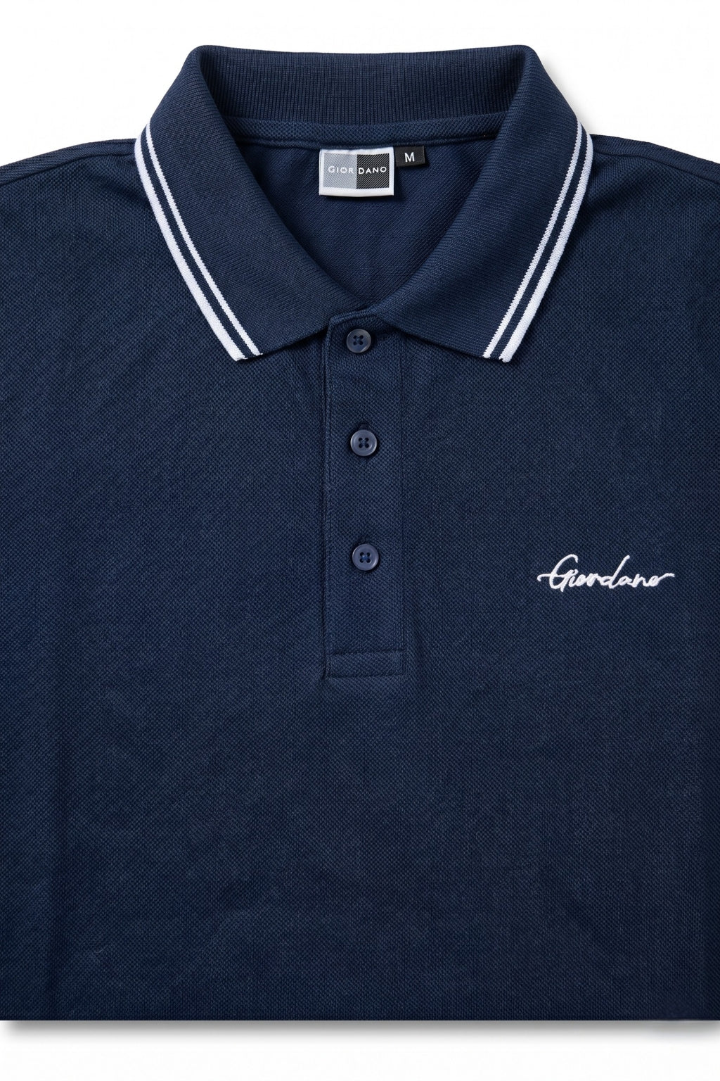 Close-up detail of Eliteez Signature Twin-Tip Polo - Navy Blue premium pique and embroidered logo.