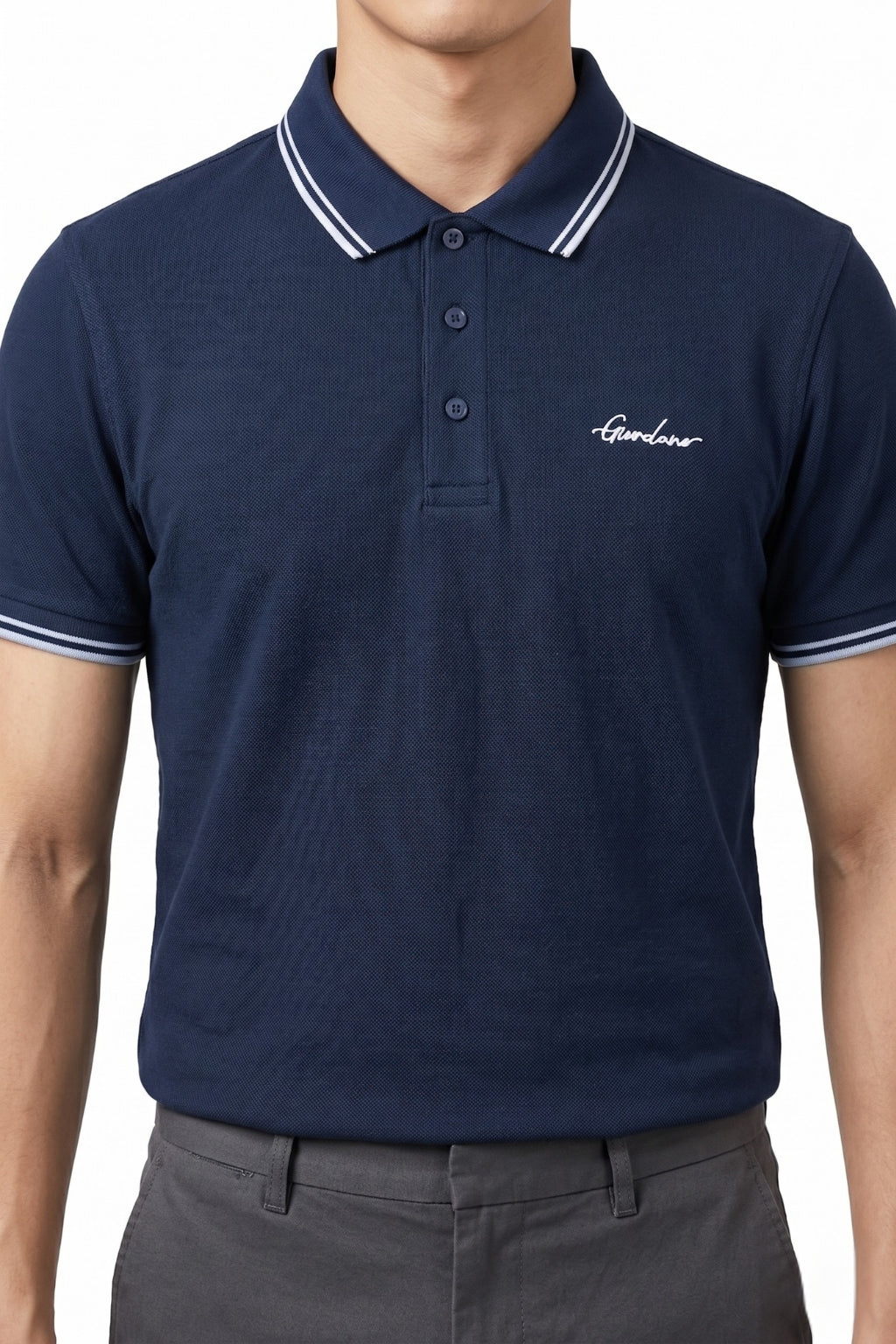 Male model wearing the Eliteez Signature Twin-Tip Polo - Navy Blue for a smart-casual look.